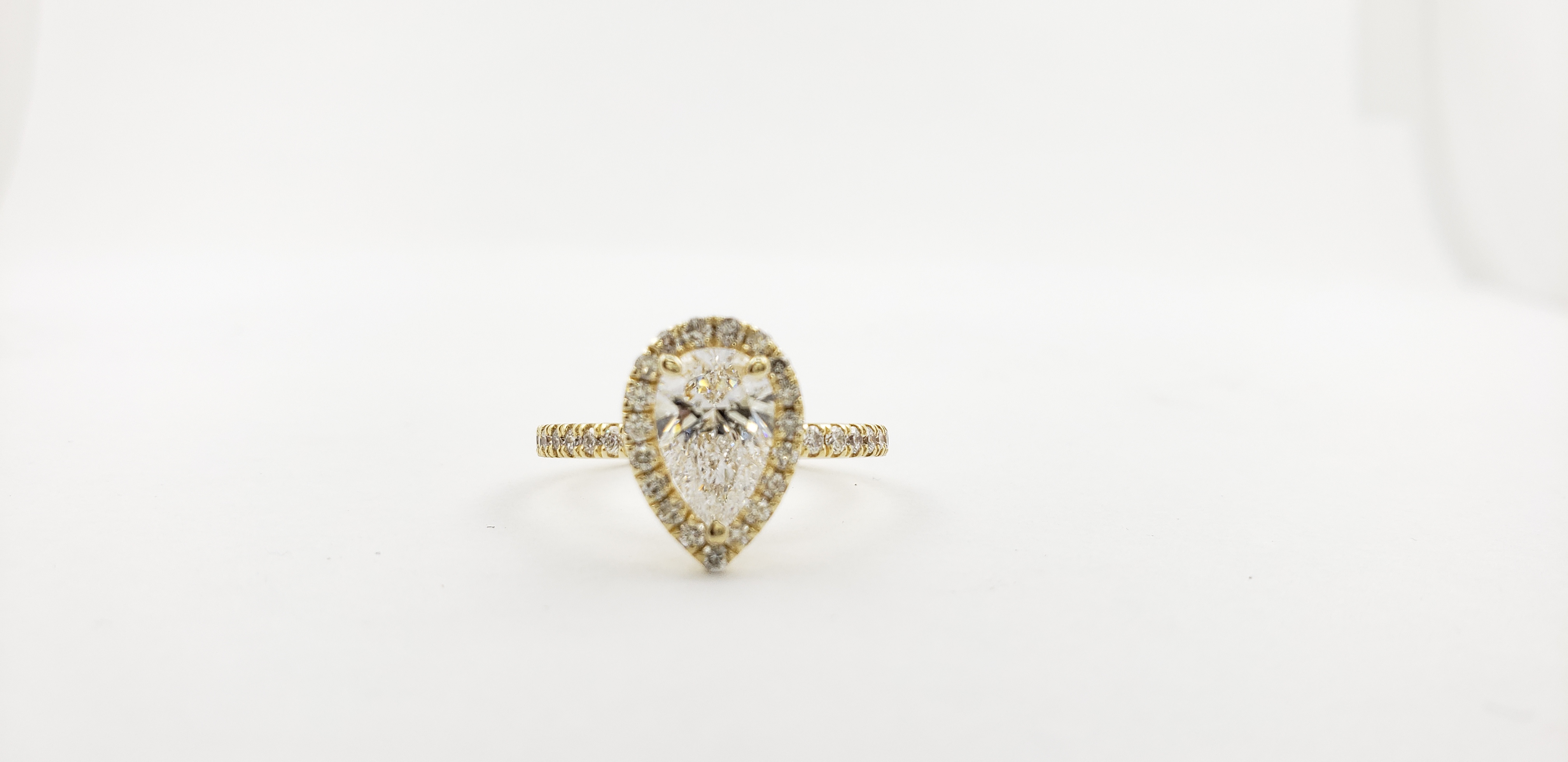Pear Shape Diamond Ring with Halo